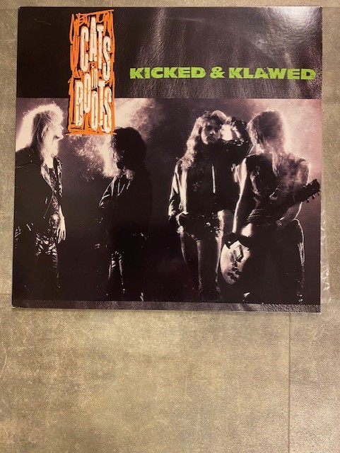 CATS IN BOOTS: Kicked & Klawed